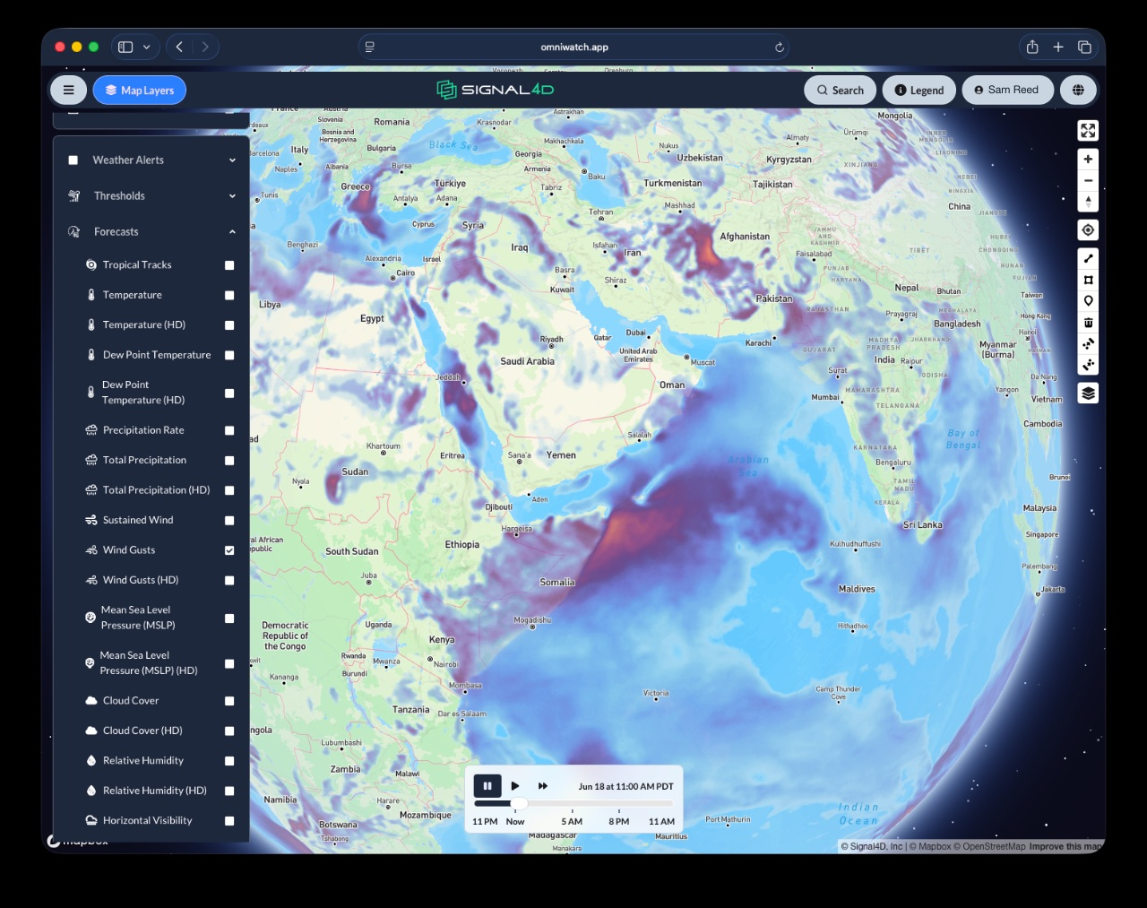 OmniWatch global animated forecast — weather, wind and precipitation rendered across the entire globe